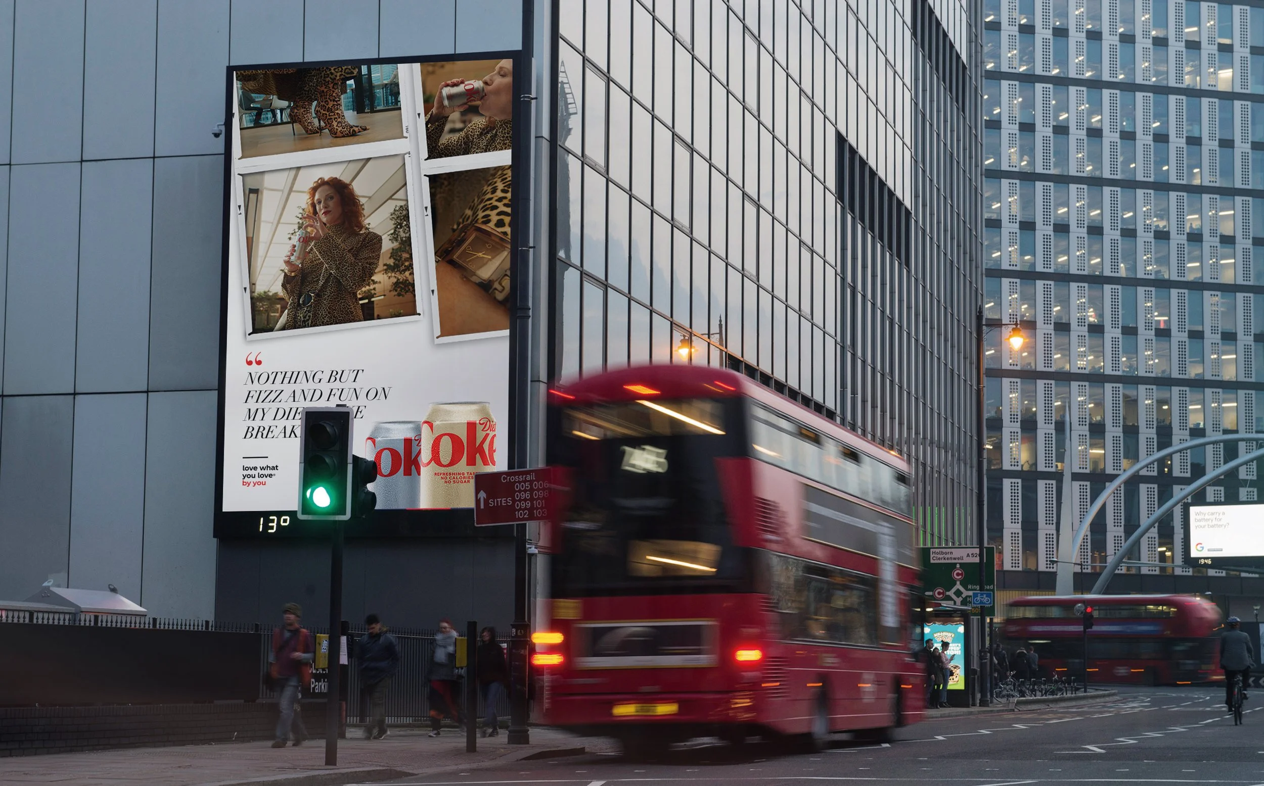 Vertical digital billboard in Holborn, London, showing a four-photo snapshot collage and the line Nothing but fizz and fun on my Diet Coke break.