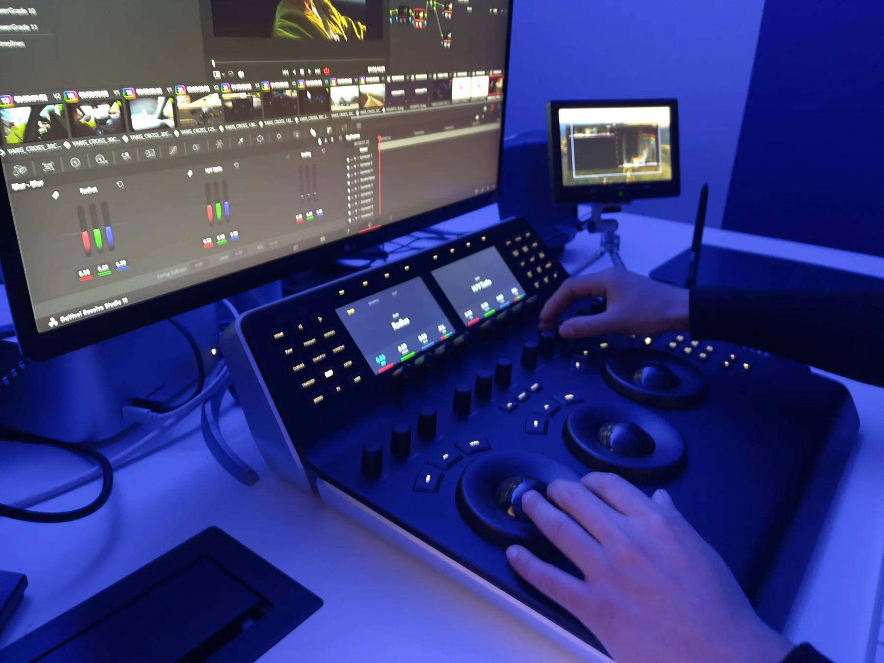 Colour grading desk lit in blue.